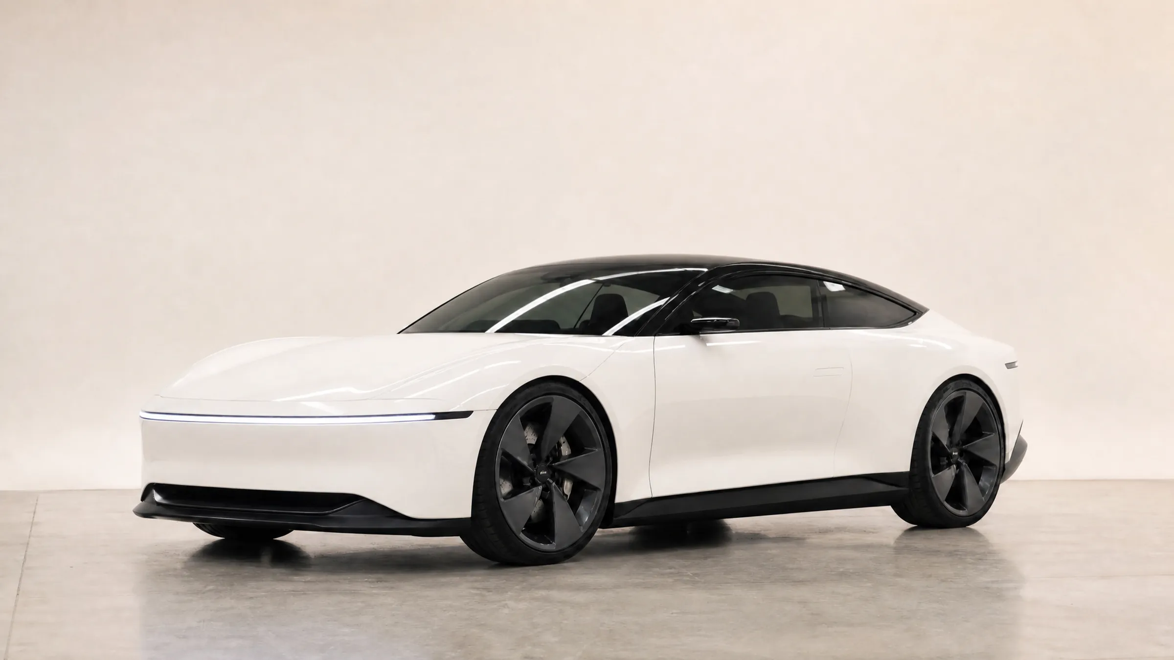 AI preview of the studio coupe in Bone Two-tone